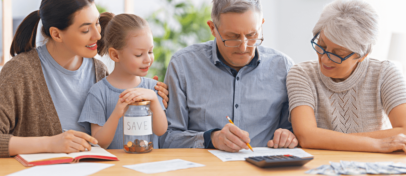 Family at a table looking at forms to help with common tax elections