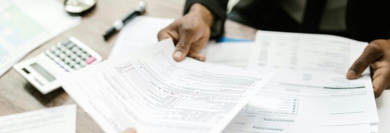 Holding Tax Documents in Hand
