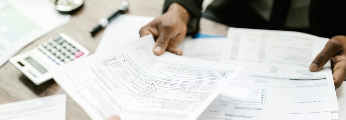 Holding Tax Documents in Hand