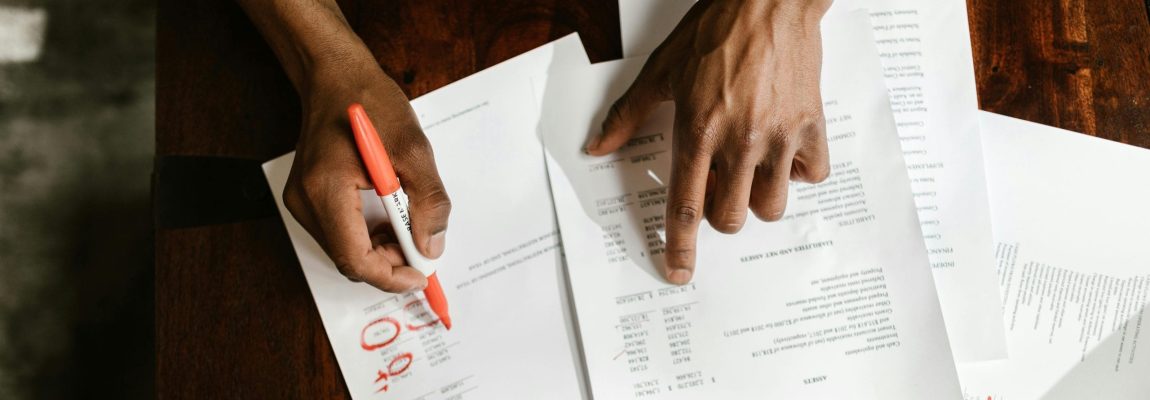 Marking on Document with Red Pen