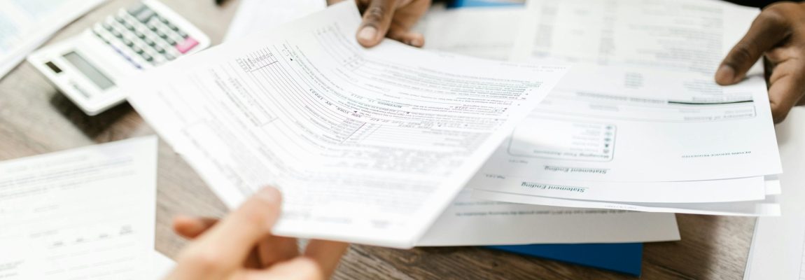 Two people reviewing document